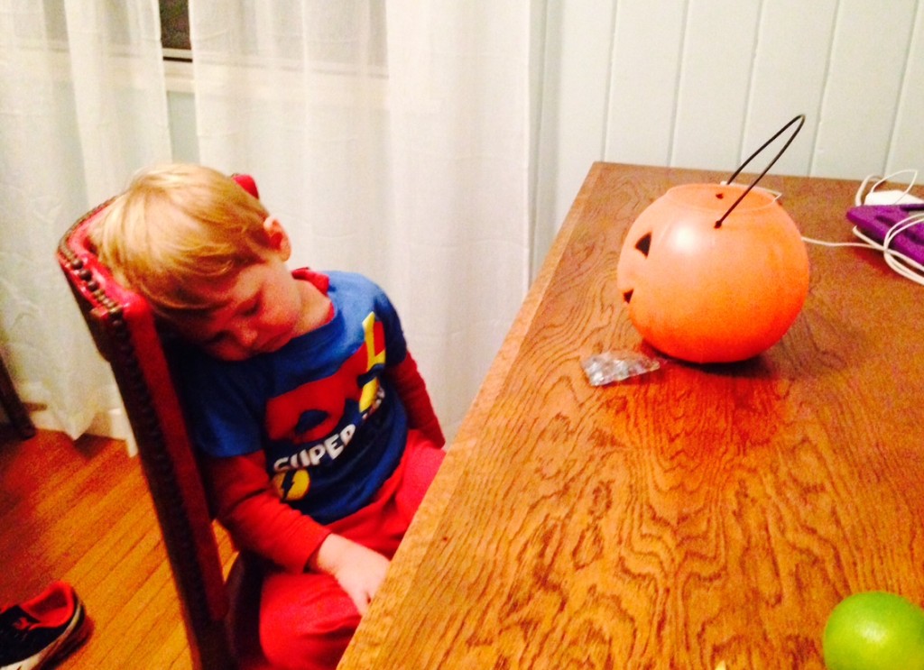 Henry asleep with pumpkin bucket